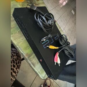 PlayStation 2 w/ 1 wireless controllers 1 wired controller